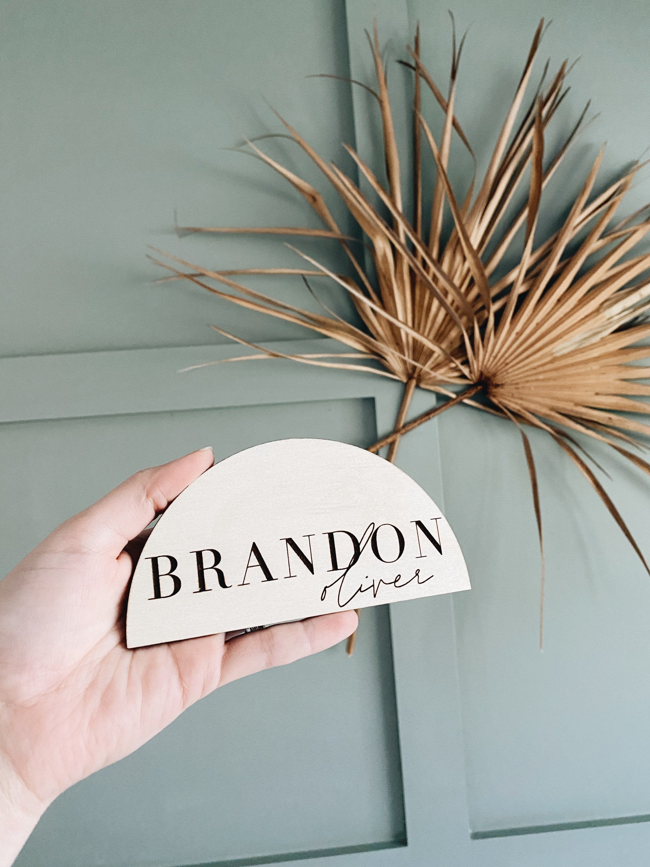 Arched wooden baby name announcement plaque